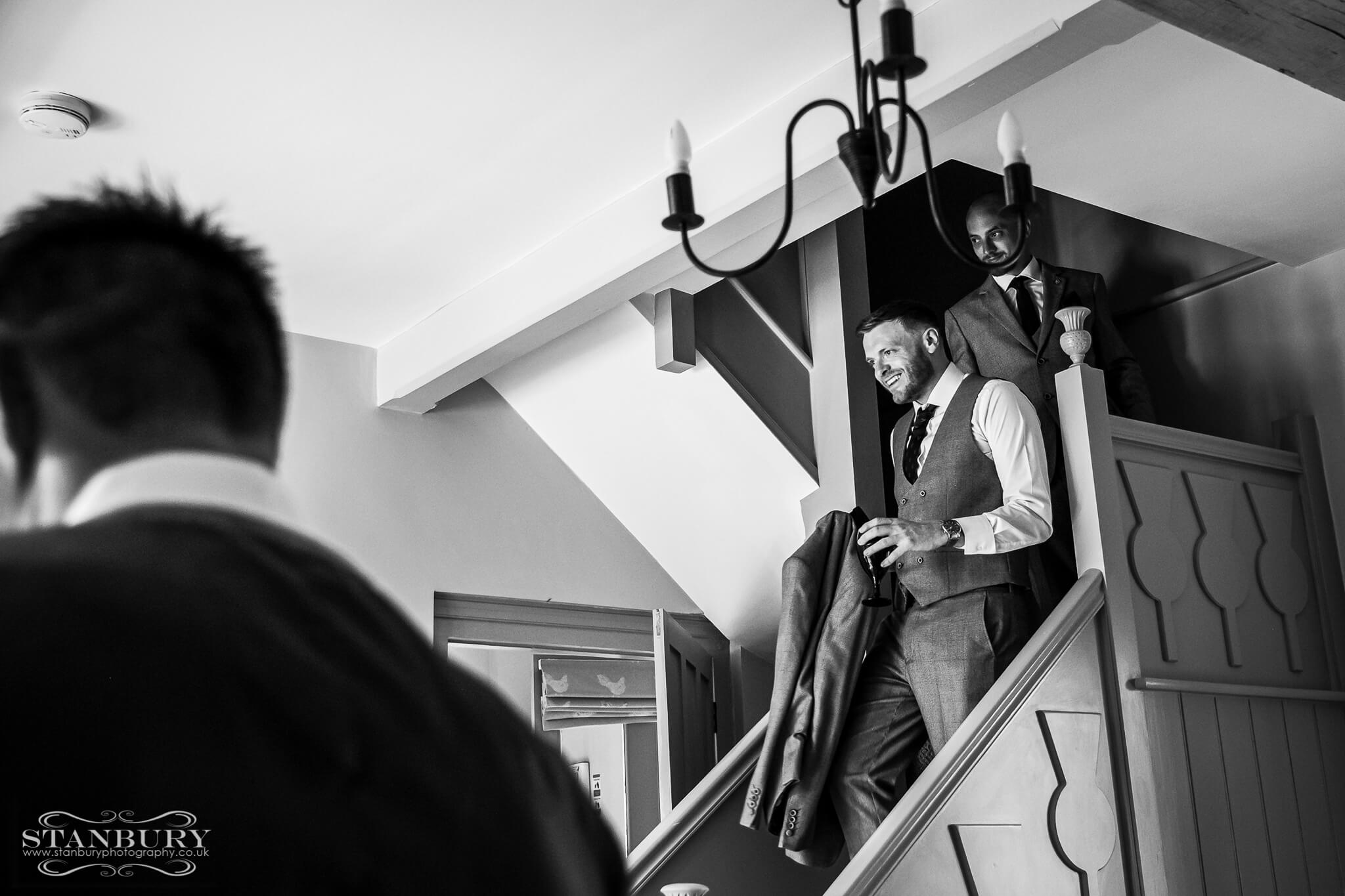 groom-getting-dressed-stanbury-wedding-photography